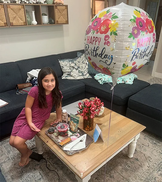 Dr. Taylor's Daughter With Birthday Fruit Tray