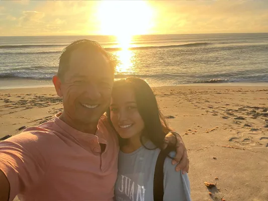 Chiropractor Torrance CA Derek Taylor With Daughter On Beach