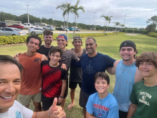 Derek Taylor With Kids Thumbs Up